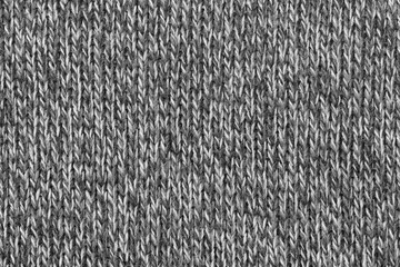 Seamless texture of knitted sweaters background. factory material texture
