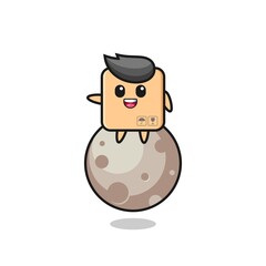 illustration of cardboard box cartoon sitting on the moon