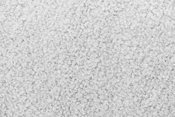 White curly wool seamless texture background. texture with short factory material.