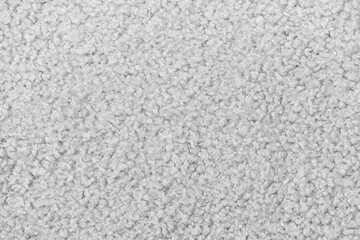 White curly wool seamless texture background. texture with short factory material.