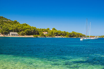 Turquoise lagoon on Adriatic coast in Croatia. Beautiful Mediterranean landscape. Soline bay on Dugi Otok island. - obrazy, fototapety, plakaty