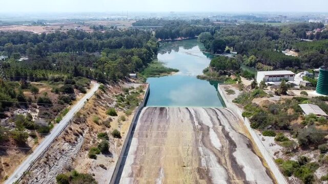Aerial view of water reservoir and closed reservoir locks of a dam. Berdan dam, Tarsus, Mersin province, Turkey