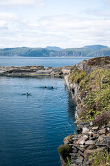 Wild swimming in the dis-used slate quarries of Easdale Island in the Inner Hebrides, Scotland. 