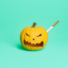 halloween pumpkin with a knife stuck in it