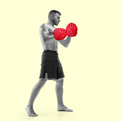 Contemporary art collage. Male boxer with raspberries fruit as boxing gloves. Healthy eating,...