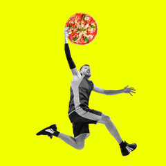 Contemporary art collage. Composition with male basketball player with pizza as ball. Healthy...