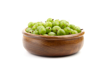 Gooseberry in wooden bowl isolated on white background. Green summer berries