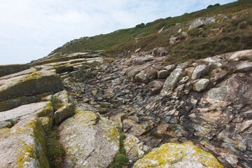 Cliffs, rocks, sea and surf on the Cornish coastline. On the Lands End pennisula between St Loy's Cove and Tater-Du lighthouse