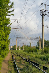Kazakhstan railway against the backdrop of greenery