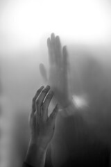 silhouette of lover hands on a black and white