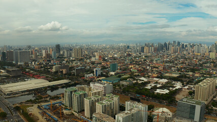Obraz premium Cityscape of Makati, the business center of Manila. Asian metropolis with skyscrapers view from above. Travel vacation concept.