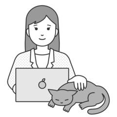 リモートワークしながら猫と戯れる女性