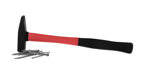 Hammer and metal nails on white background