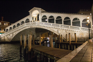 Venice, Italy, January 28, 2020 evocative image of the Rialto Bridge by night, one of the most famous symbols of the city