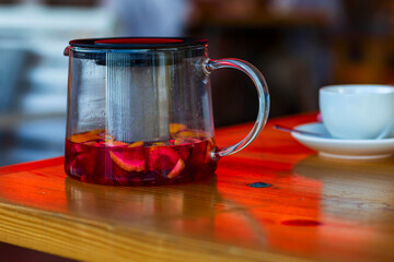 citrus tea in a glass teapot