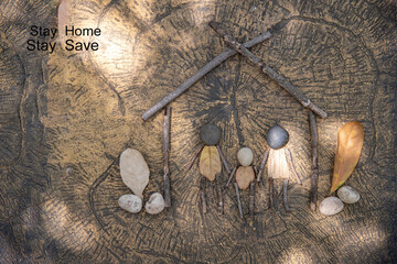 stay home, stay safe  concept of self quarantine at home as preventative measure against virus outbreak. Flat lay with inspiration quote, staying at home during pandemic