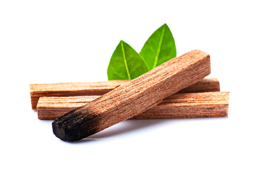 Sandalwood sticks with leaves on white backgrounds