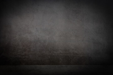 Black-textured floors and gray-textured cracked walls.