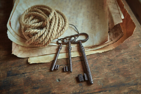 Rope, keys and a manuscript. Preparation of equipment for the discoverer, traveler.