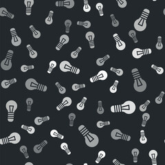 Grey Light bulb with concept of idea icon isolated seamless pattern on black background. Energy and idea symbol. Inspiration concept. Vector