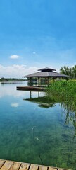 Obraz premium wooden bridge over the lake