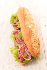 sandwich- baguette with lettuce and salami