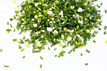 Chopped spring onions on white background