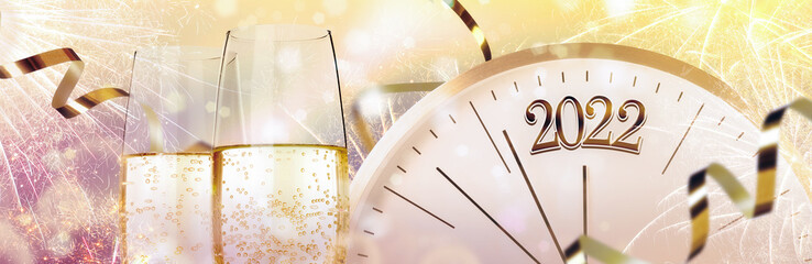 Obraz na płótnie Canvas Glasses of sparkling wine, clock, shiny streamers and firework on color background, banner design. Countdown to New Year 2022