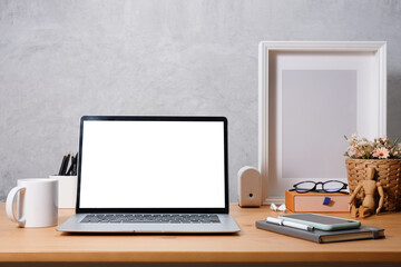 Fototapeta premium Workspace desk and laptop. copy space and blank screen. Business image, Blank screen laptop and supplies..