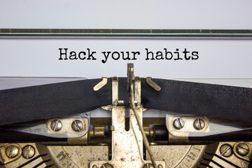 Hack your habits symbol. Words 'Hack your habits' typed on retro typewriter. Business, psychology and hack your habits concept. Copy space.