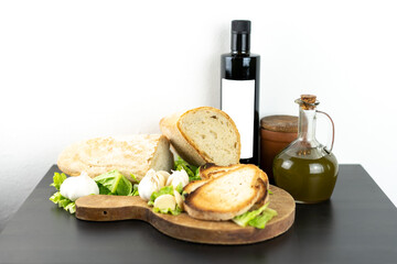 Food display for olive oil bottle ready for fettunta with withe label for mockup purposes