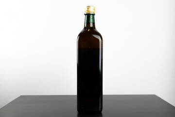 Dark olive oil bottle without label for mockup purposes