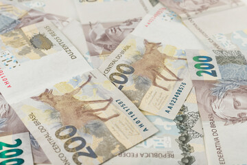 200 reais bills background pattern. Brazilian bank notes