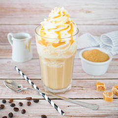 Frappuccino with whipped cream and caramel sauce.