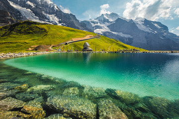 Fallbodensee lake and high mountains with glaciers, Bernese Oberland, Switzerland