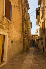 A residential road in the historic medieval hill village of Buje in Istria, Croatia
