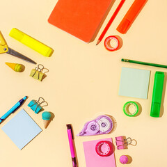 Colorful square background with school supplies and copy space. Back to school concept backdrop