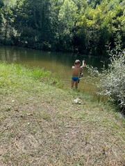 Obraz na płótnie Canvas child running in the river