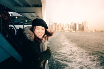Asian Smiling woman traveler Holiday Relaxation Concept. New York city