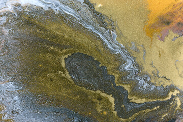 White, gray and black ripple pattern. Marble abstract texture with gold particles.