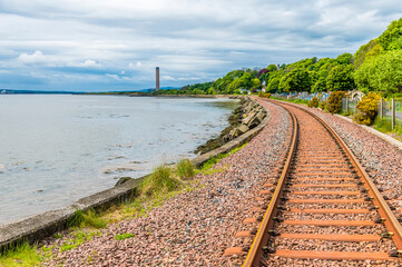 A view along the coastal railway at Culross, Scotland on a summers day