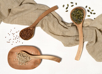 Wooden spoons with various seeds