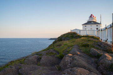 Fototapeta na wymiar Rugged Coastal Lighthouse at Cape Spear, Newfoundland