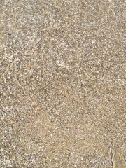shoreline with small pebbles and water close-up. High quality photo