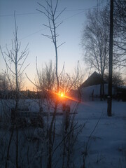 Sunset on a late winter cold evening in a remote Russian village.
