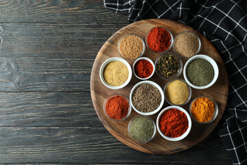 Concept of aromatic spices on rustic wooden table