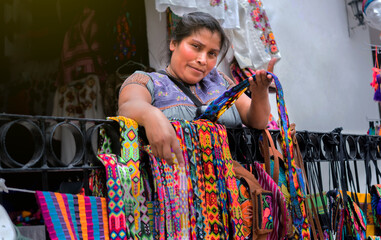 Portrait of a Mexican artisan saleswoman. Portrait of a Mexican artisan saleswoman. looking at the...