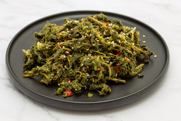 Dried Radish Leaves with soy bean sauce which is called Siraeginamul