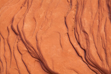 Closeup of rich colors, layers and textures of red rock in Utah
