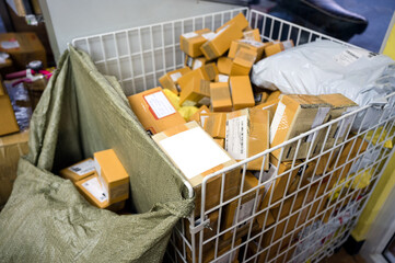Cardboard box, shipping of online shopping products in basket at distribution warehouse